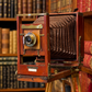 Red bellows camera with tripod. Decorative, not working. Ca. 1905–1925. Antique.