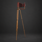 Red bellows camera with tripod. Decorative, not working. Ca. 1905–1925. Antique.
