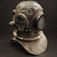 English copper and bronze diving helmet with natural green patina, "North Eastern Marine Engineering Co. Ltd." Ca. 1910–1930. Vintage.