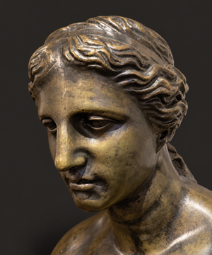 Busto Venus de Milo en bronce patinado. Mediados del siglo XX. Base de bronce integrada. Vintage.