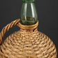 Botellón de vidrio soplado con cestería  Ca 1950