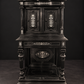 Mueble aparador en madera ebonizada con incrustaciones de hueso. Estilo Neorrenacimiento. Ca. 1870. Con detalles de conservación.